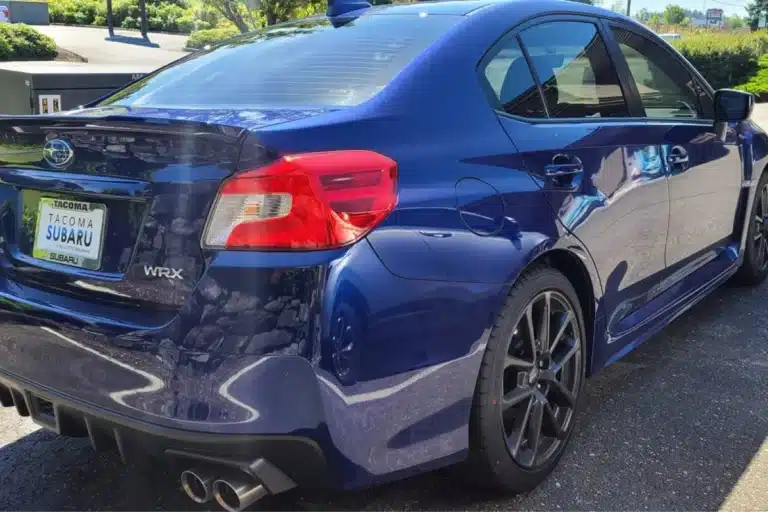 Blue car with paint protection film on the exterior.