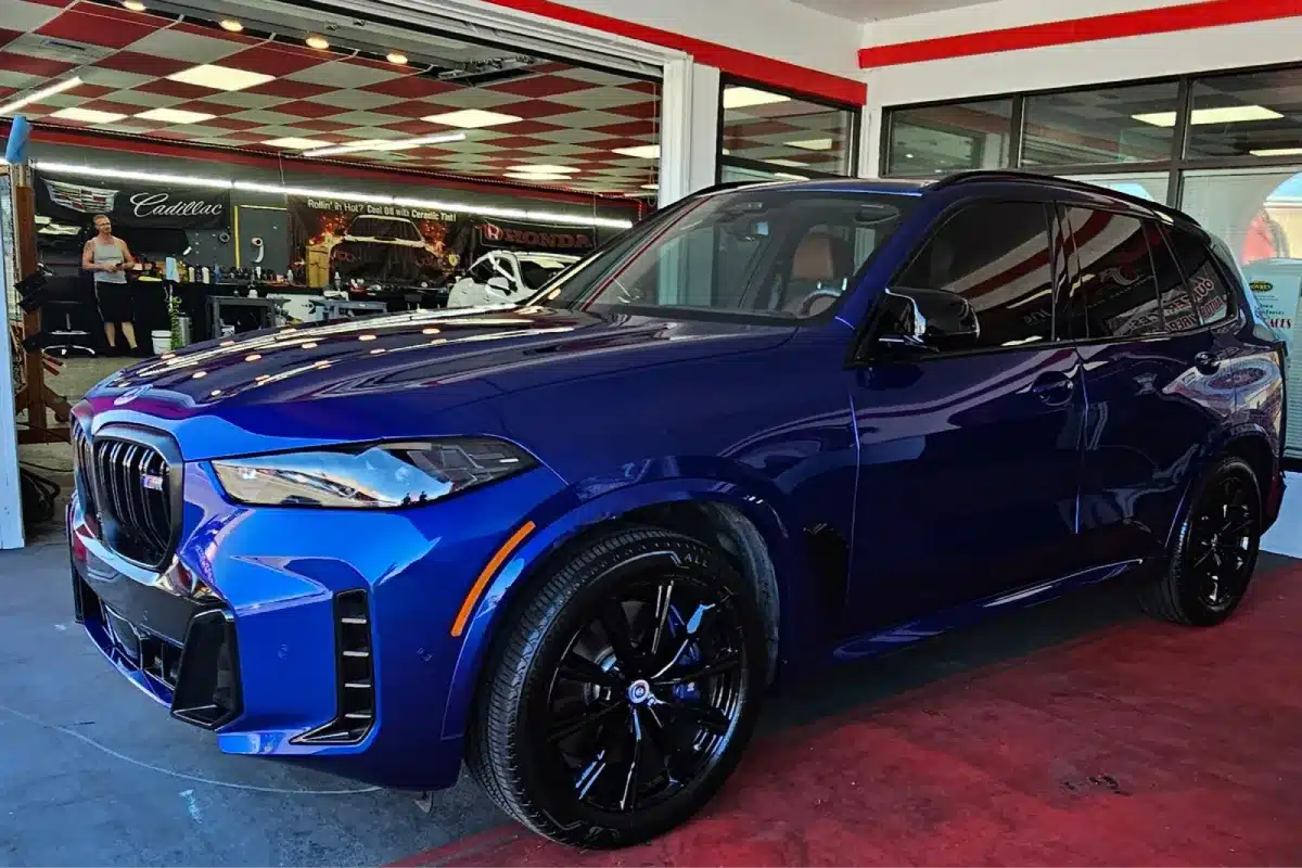 Car with ceramic coating providing deep gloss finish and long-lasting surface protection.