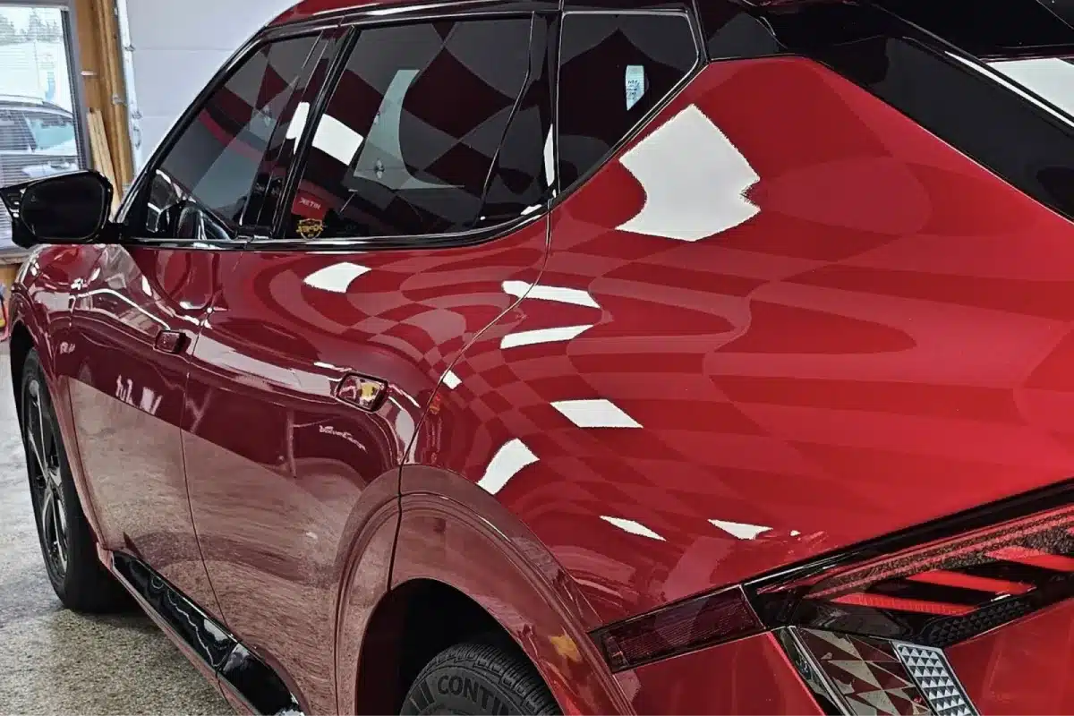 Red SUV with a glossy ceramic coating finish.